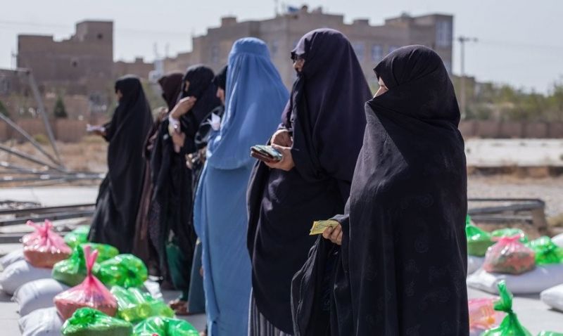afghan-women-receive-food-rations-at-a-food-distribution-site-in-herat-ae0ffb616d8faffcbb1bf48c7c49344f1653583402.jpg