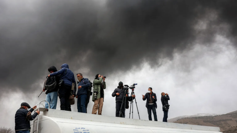 journalists-cover-a-nearby-fire-following-an-overnight-airstrike-on-the-shahran-oil-refinery-in-northwestern-tehran-1bf5ef387c7de817c8c8f17d3c64493c1773417261.png