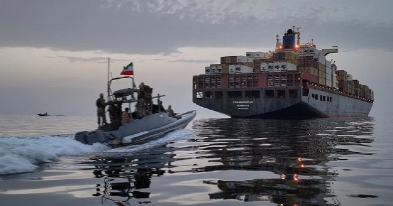 an-iranian-speedboat-approaches-the-cargo-ship-during-what-state-media-described-as-the-seizure-of-one-of-two-vessels-accused-of-violations-in-the-strait-of-hormuz-a963a5c5d99615d2194d172bab34c9a31779076541.jpg