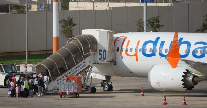 passengers-embark-on-a-flydubai-aircraft-at-ben-gurion-international-airport-near-tel-aviv-israel-wednesday-sept-f4e277a122f883575cbd63f562896f691790793656.jpg