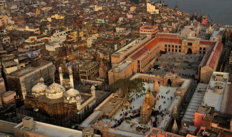 an-aerial-view-shows-gyanvapi-mosque-left-and-kashiviswanath-temple-on-the-banks-of-the-river-ganges-in-varanasi-india-dec-9f5579c9b231ab774ea31544c38275661653550959.jpg