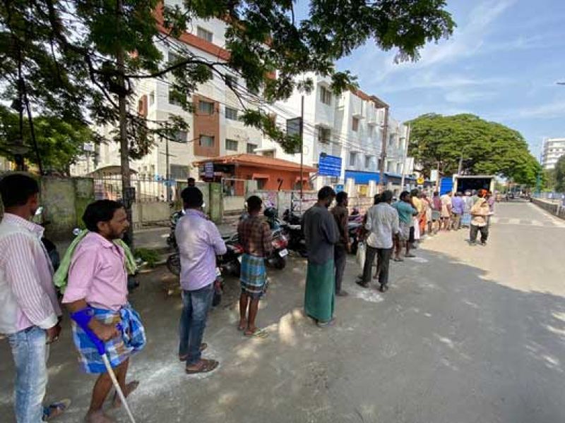 daily-wage-workers-stand-in-line-to-receive-a-meal-prepared-by-no-food-waste-a-gfn-supported-food-bank-in-india-d364d7fd0550154f5df500fb87699d0e1653717805.jpg