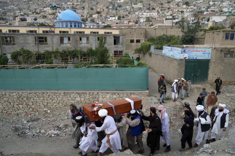 mourners-carry-the-body-of-a-victim-of-a-mosque-bombing-in-kabul-afghanistan-thursday-aug-7f948a95961bff34101bbc371125a1b61660807859.jpg