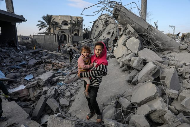 a-palestinian-girl-holding-a-child-after-an-israeli-bombing-of-omar-bin-abdul-aziz-mosque-in-rafah-gaza-on-january-25-2024-8b62fb7de7049bdaedcb457c2e6de11b1710615591.jpg