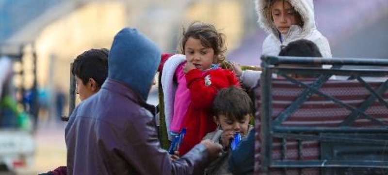 children-arrive-with-their-families-at-a-reception-centre-in-ar-raqqa-city-syria-1ec2bd5b83712395356a6eea65d245cd1734071397.jpg