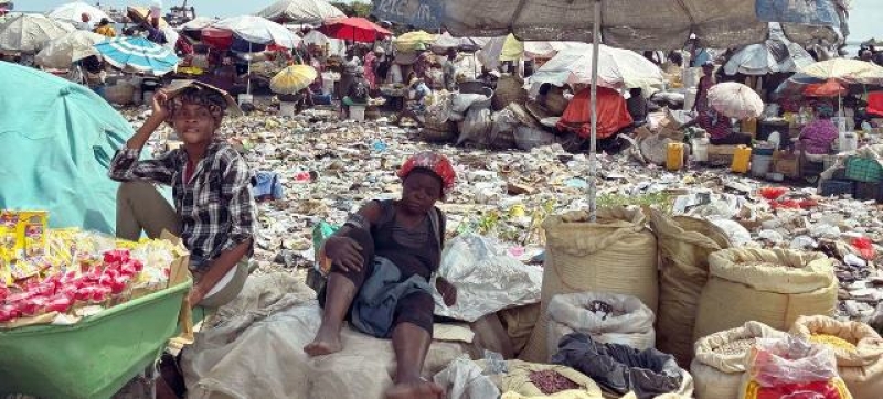 vendors-surrounded-by-garbage-sell-goods-in-port-au-prince-haiti-56aa2b6717132c9b526eab2155021f3c1744948241.jpg